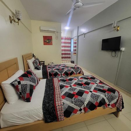 קראצ'י Hotel Rooms Dha מראה חיצוני תמונה