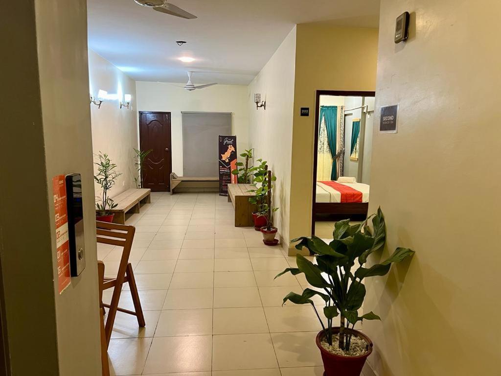 קראצ'י Hotel Rooms Dha מראה חיצוני תמונה
