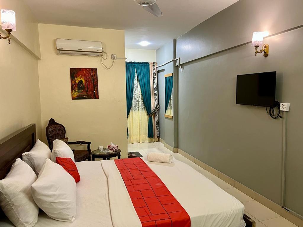 קראצ'י Hotel Rooms Dha מראה חיצוני תמונה