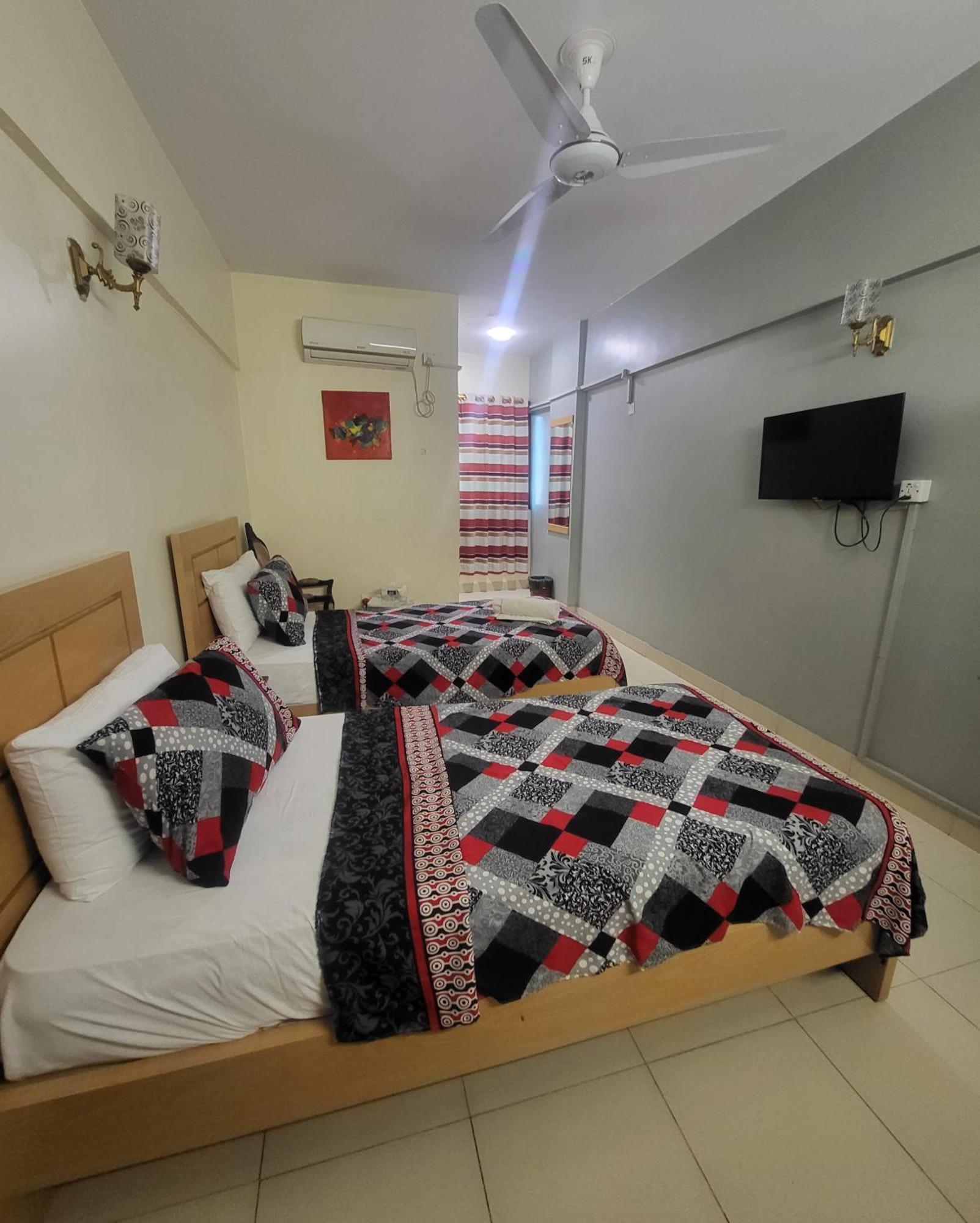 קראצ'י Hotel Rooms Dha מראה חיצוני תמונה