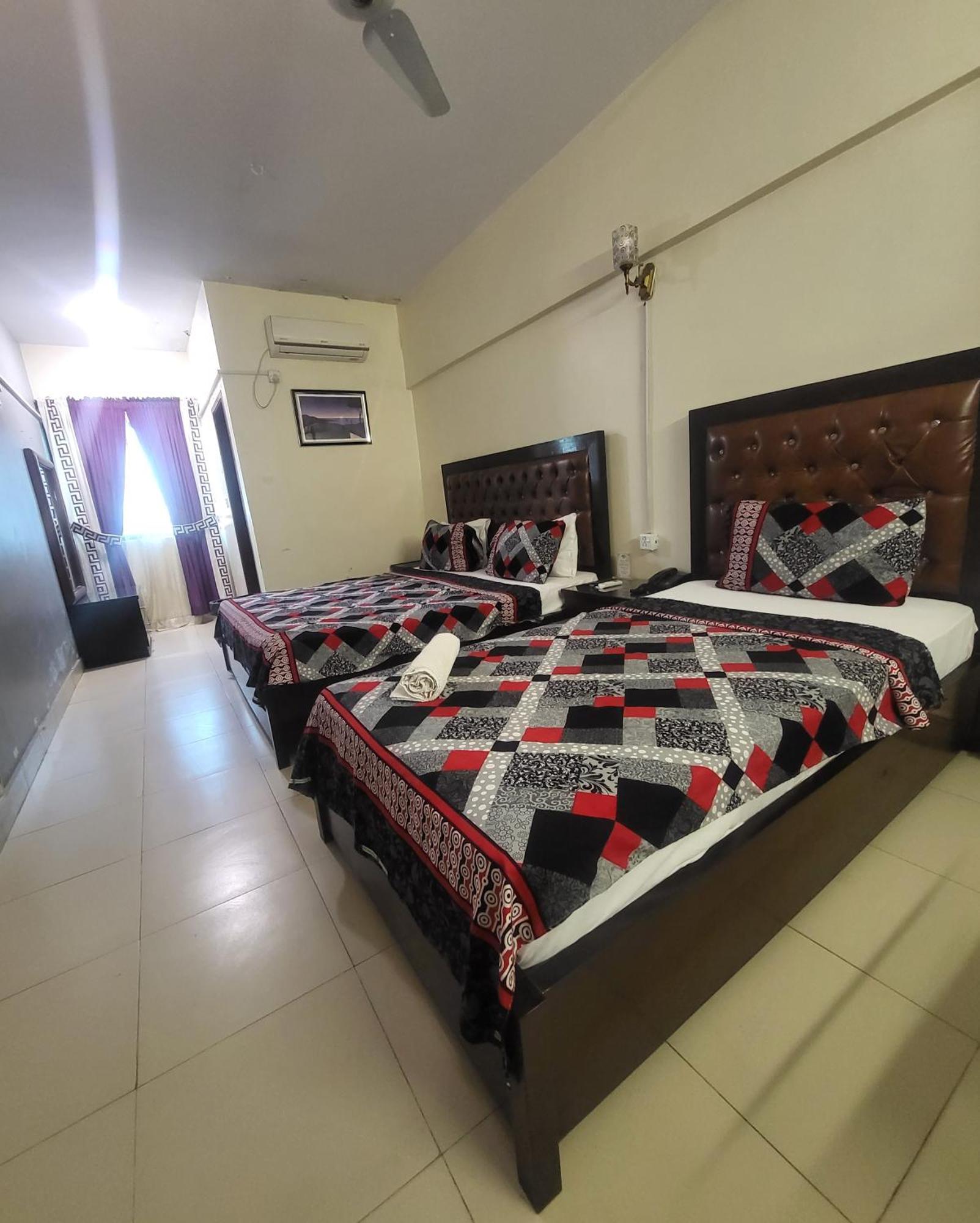 קראצ'י Hotel Rooms Dha מראה חיצוני תמונה
