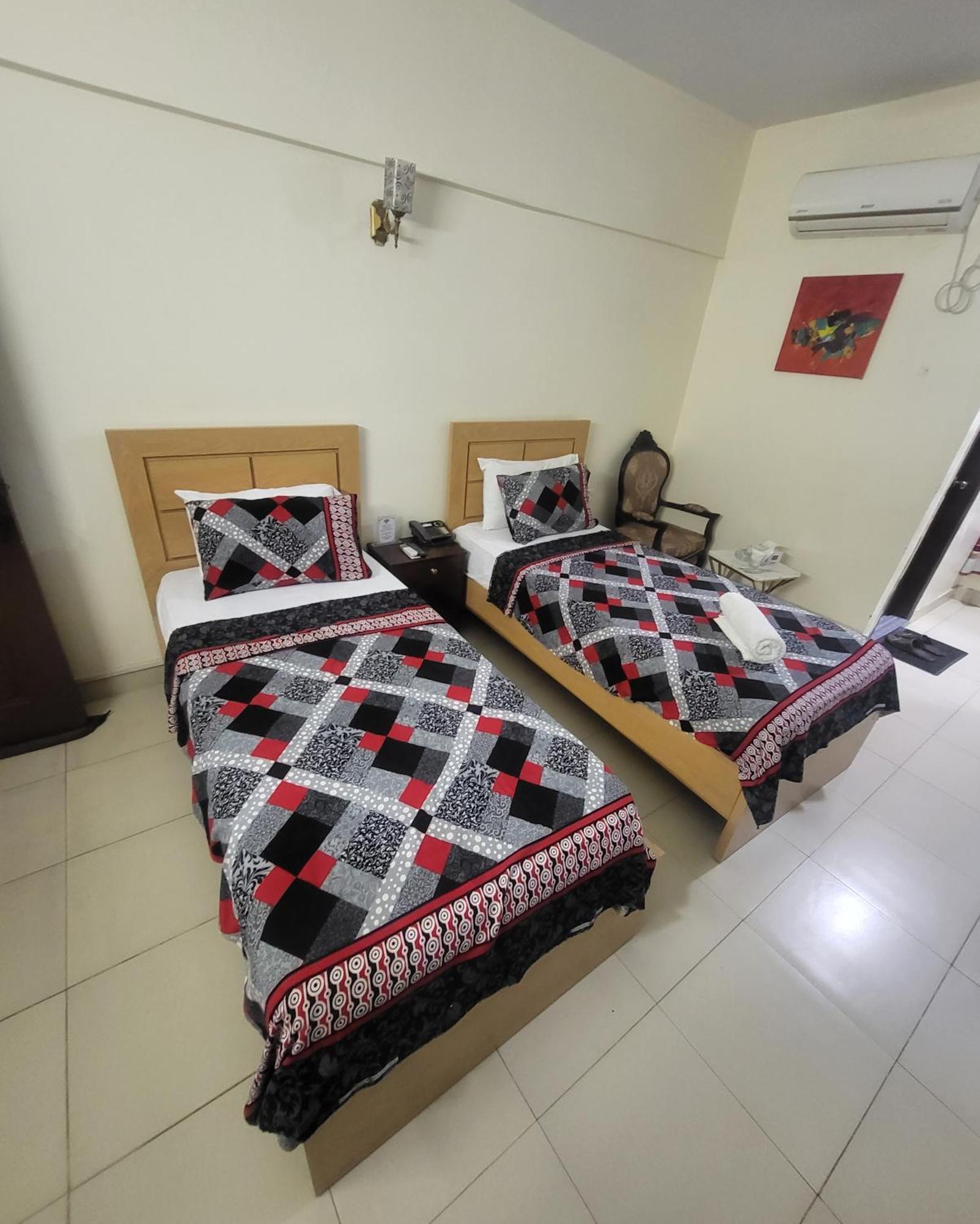 קראצ'י Hotel Rooms Dha מראה חיצוני תמונה